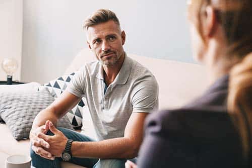 A man in cognitive-behavioral therapy treatment